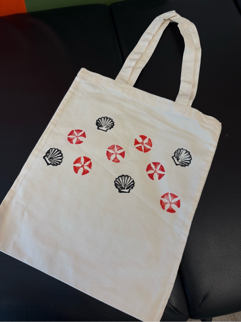Hand-Stamped Canvas Tote Bag in Natural with Red & Black Shell Motif